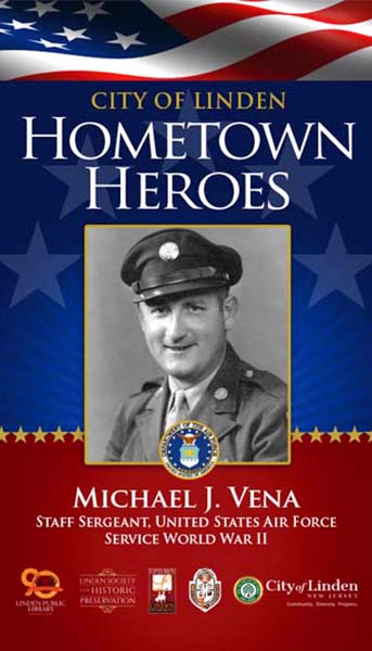 A Hometown Heroes veteran banner displayed on a Wood Avenue lamppost with autumn leaves.